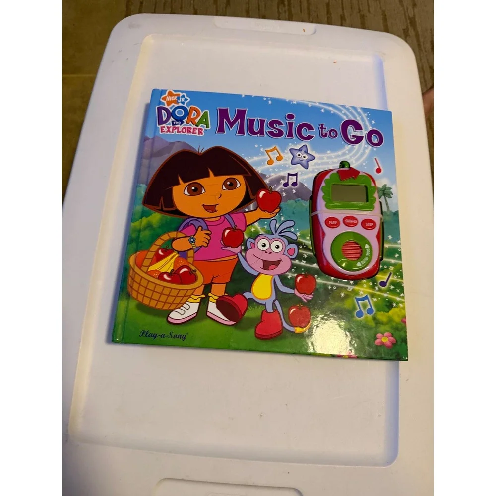 VTG Nick Jr Dora the Explorer Music to Go Play-a-Song Book with Toy Music Player